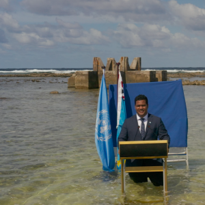 Hon. Minister Simon Kofe filming a video statement in Tuvalu on climate mobility for COP26 Tuvalu.TV  810x532